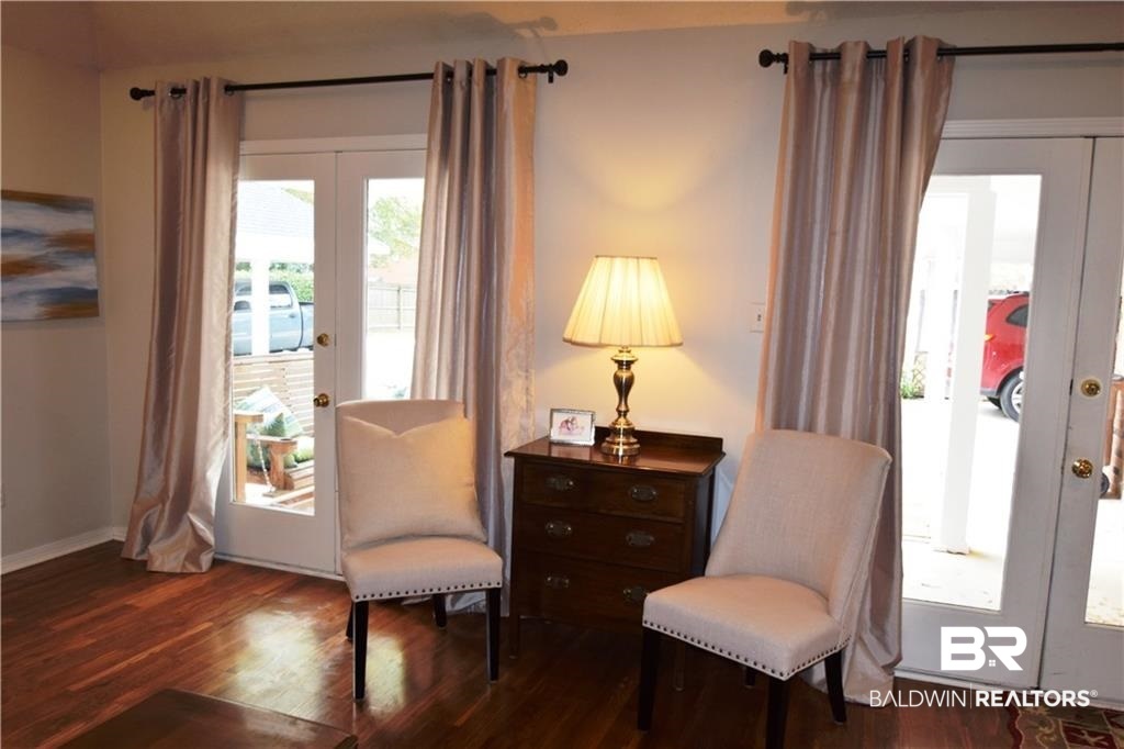 852 West Briar Court Mobile, AL 36609 - Photo 14 of 40 Double french doors from den to covered porch.