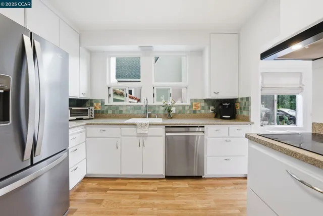 a workspace with furniture and a window