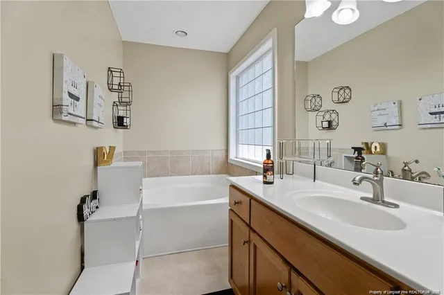 a bathroom with a sink and a bathtub