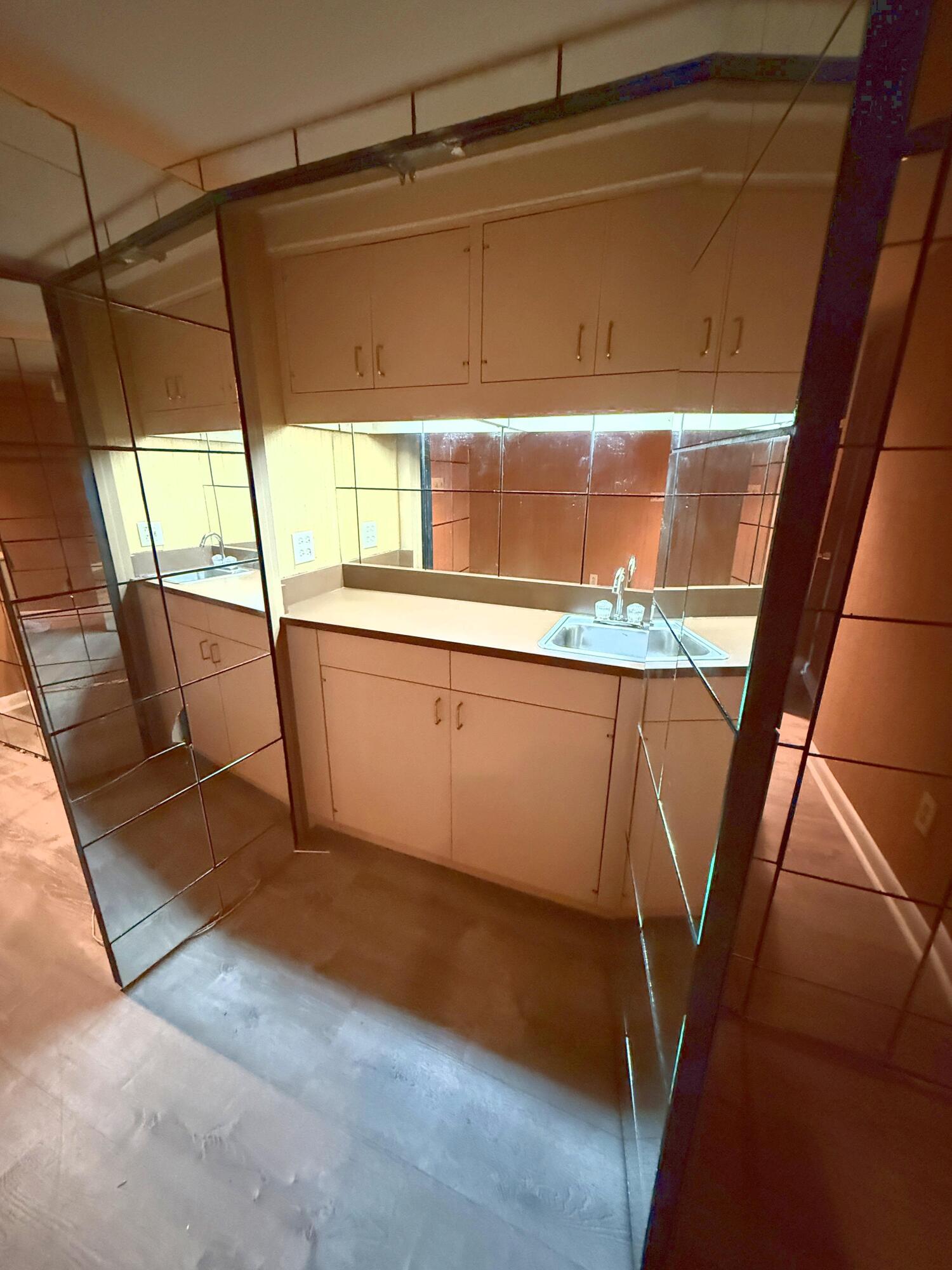 2049 Lakeside Drive Lexington, KY 40502 - Photo 48 of 63 Hidden Built-In Safe Under Wet Bar