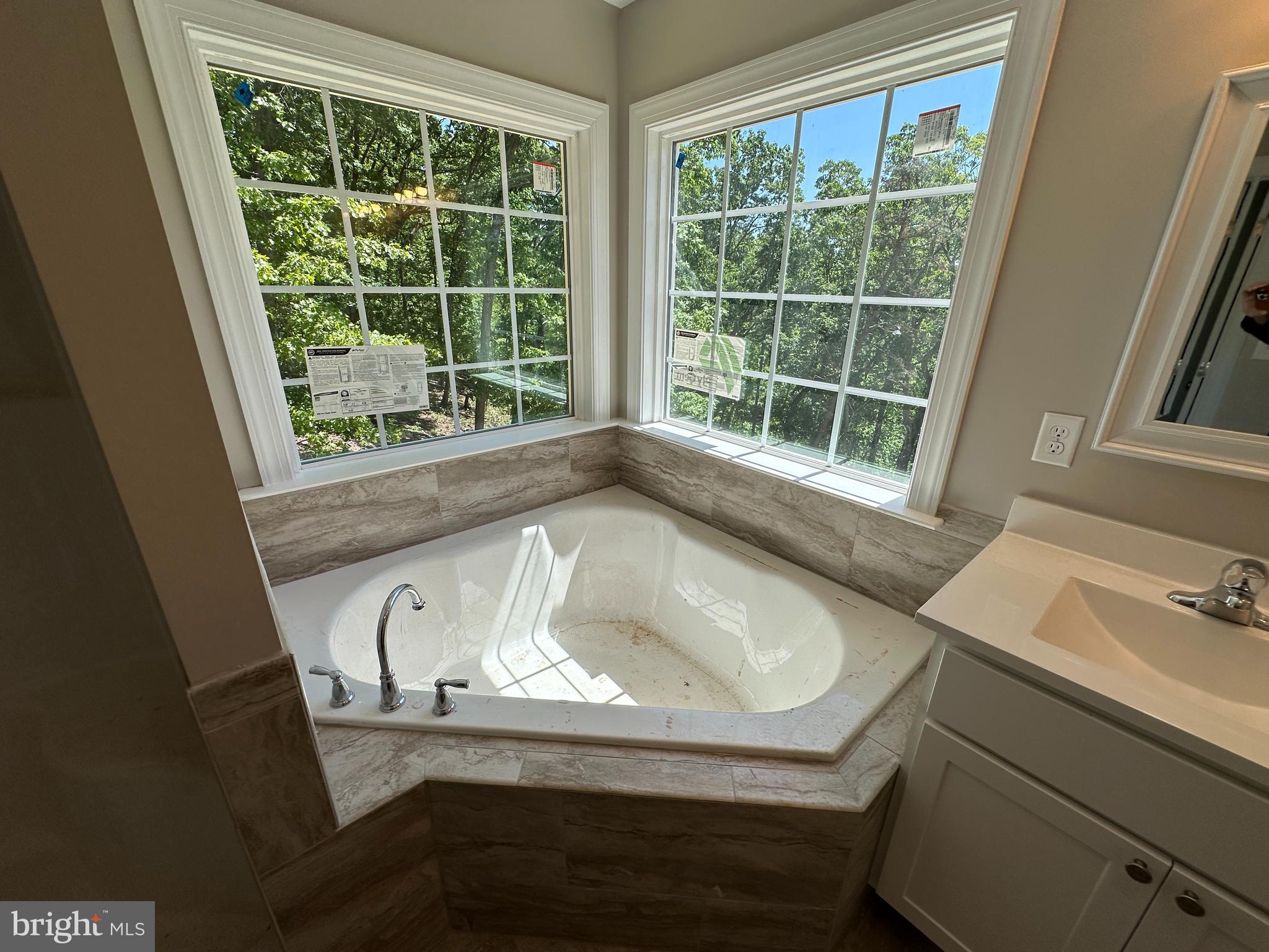 211 Inca Trail Winchester, VA 22602 - Photo 16 of 23 a bathroom with a sink and a bathtub