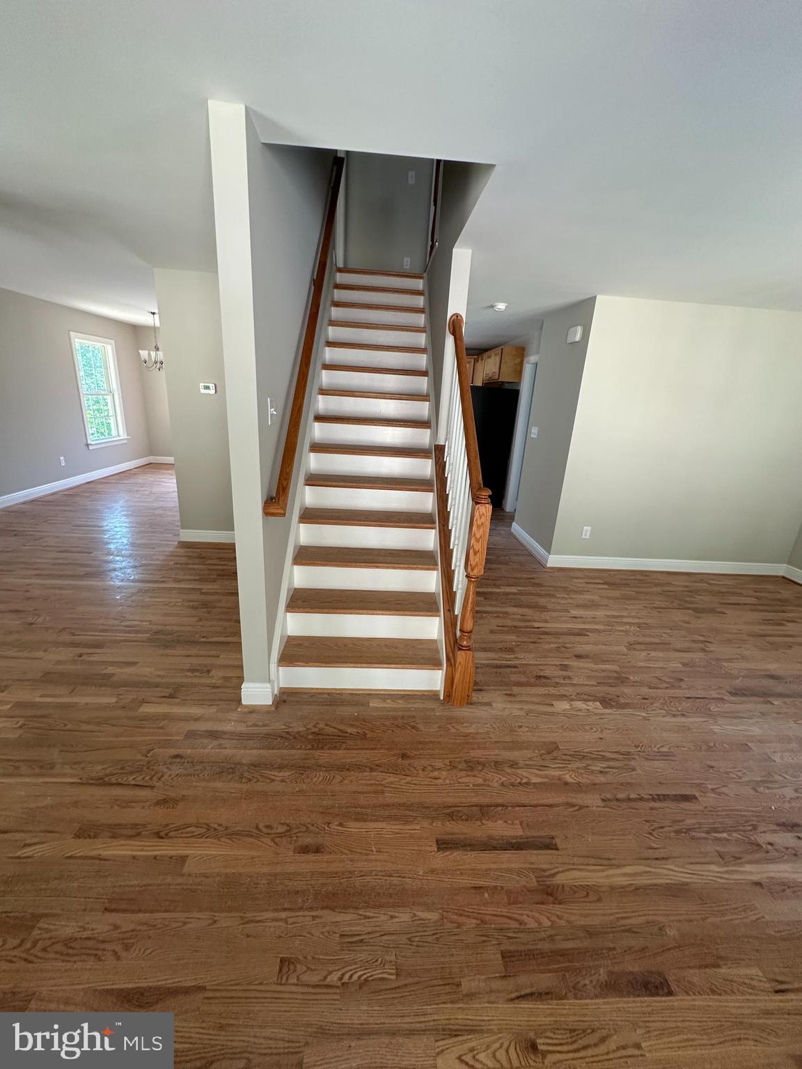 211 Inca Trail Winchester, VA 22602 - Photo 3 of 23 a view of entryway and hall with wooden floor