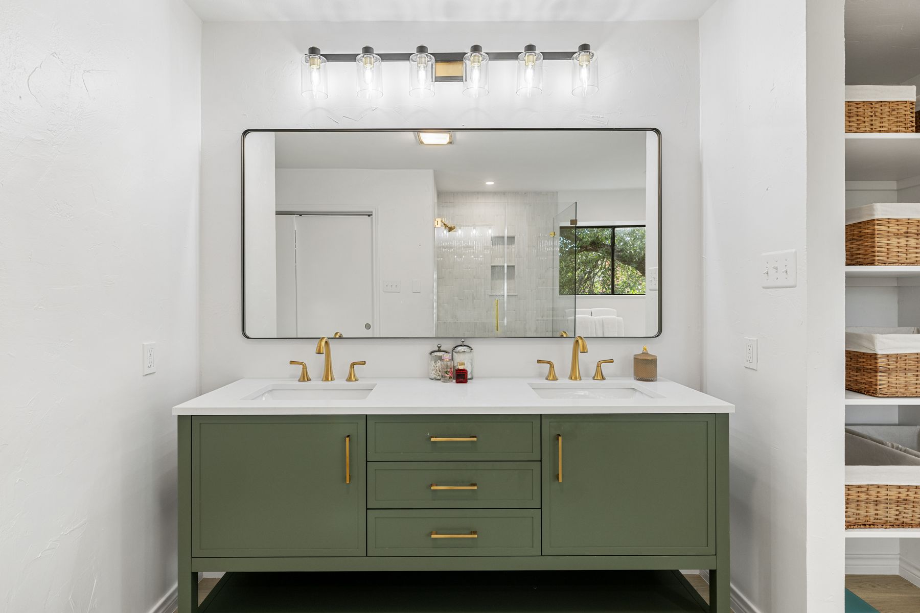 5 Valhalla Court The Hills, TX 78738 - Photo 16 of 34 Designer double vanity with quartz counters and brushed gold fixtures.