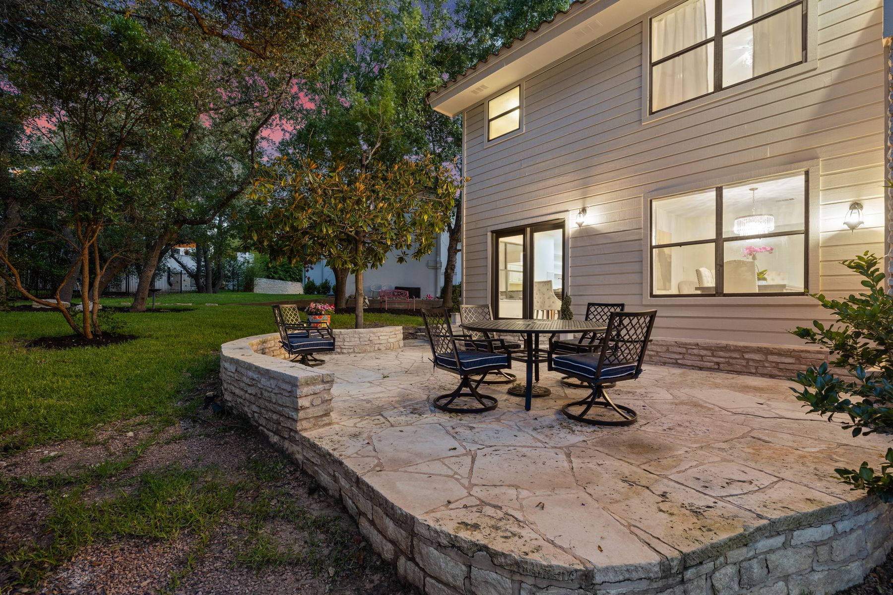 5 Valhalla Court The Hills, TX 78738 - Photo 25 of 34 Inviting stone patio—ideal for outdoor dining and entertaining.