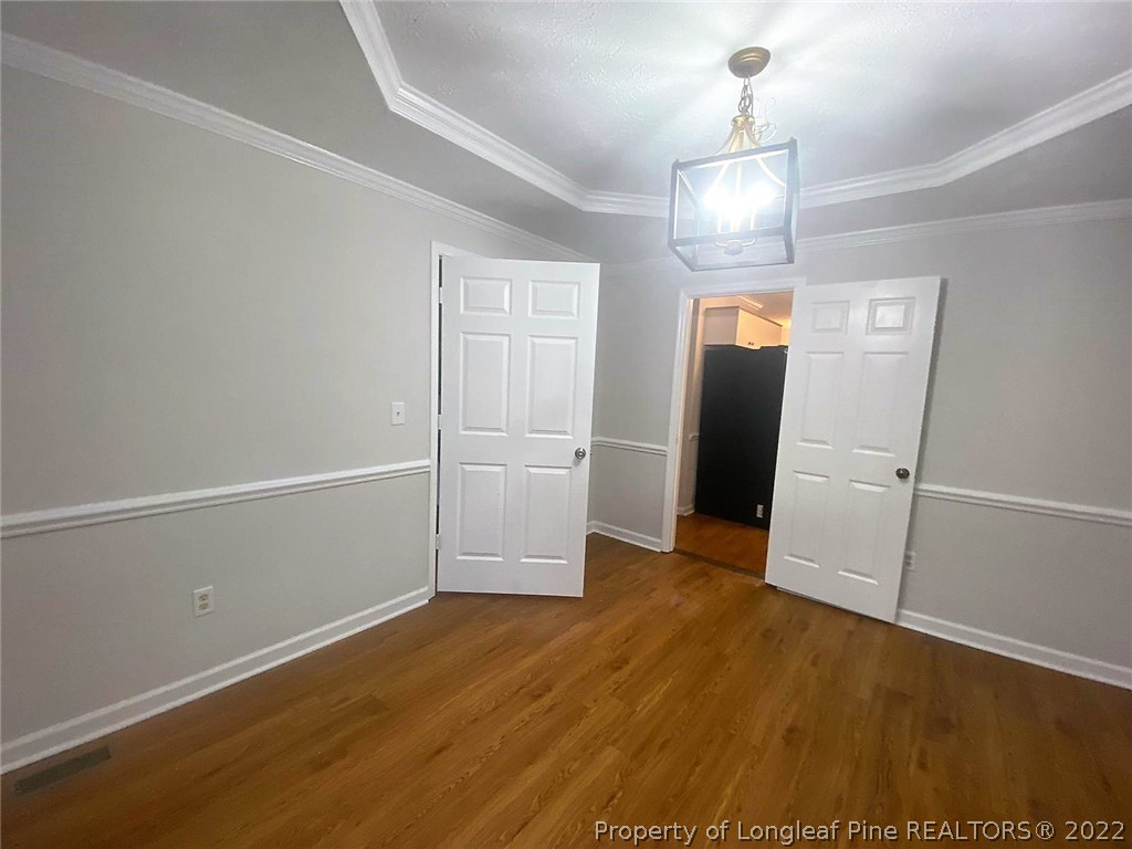 944 Flintwood Road Fayetteville, NC 28314 - Photo 14 of 50 an empty room with wooden floor