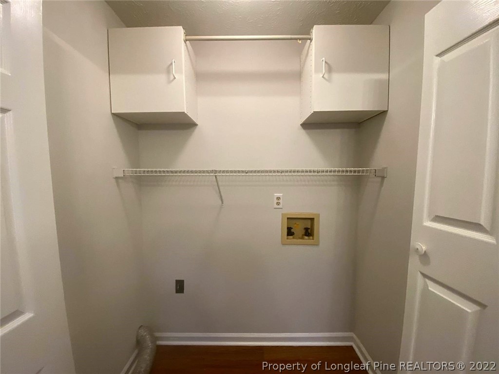 944 Flintwood Road Fayetteville, NC 28314 - Photo 27 of 50 a view of storage and utility room with racks on the wall