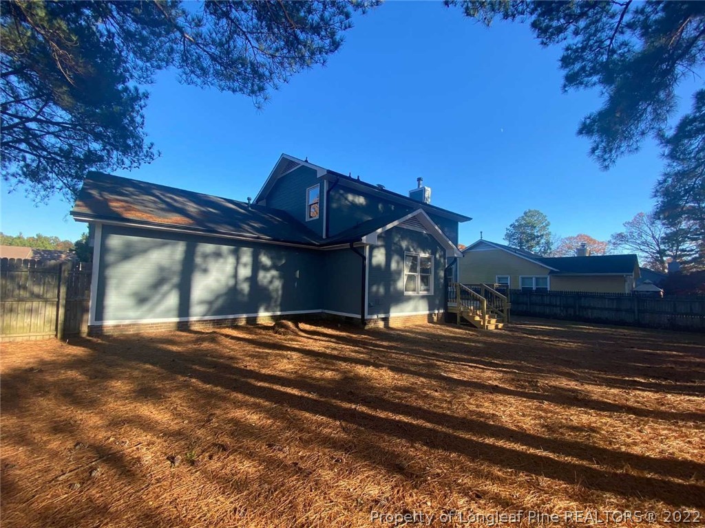944 Flintwood Road Fayetteville, NC 28314 - Photo 28 of 50 a front view of a house with a yard