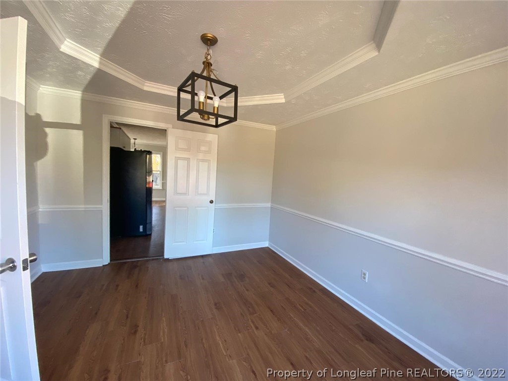 944 Flintwood Road Fayetteville, NC 28314 - Photo 37 of 50 a view of a hallway with wooden floor