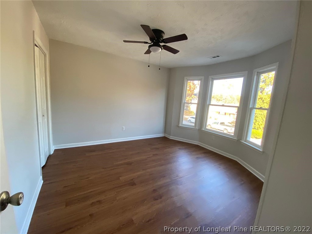 944 Flintwood Road Fayetteville, NC 28314 - Photo 43 of 50 wooden floor in an empty room with a window