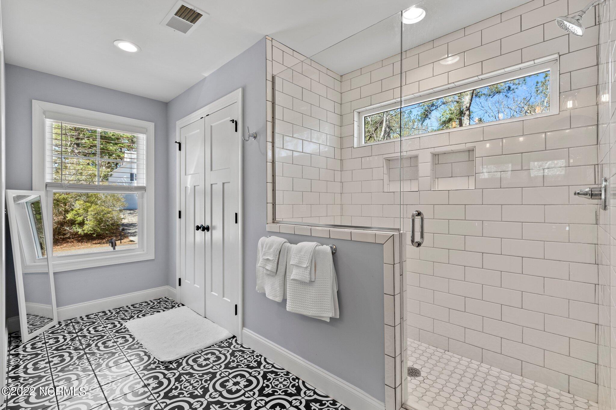 6 Alexander Lane Pinehurst, NC 28374 - Photo 31 of 52 Primary Bath with walk-in shower and huge linen closet