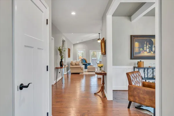 a view of a livingroom with furniture and wooden floor