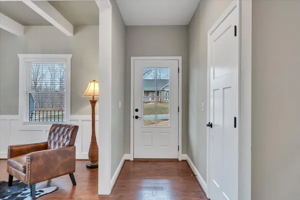 a view of a livingroom with furniture and windows