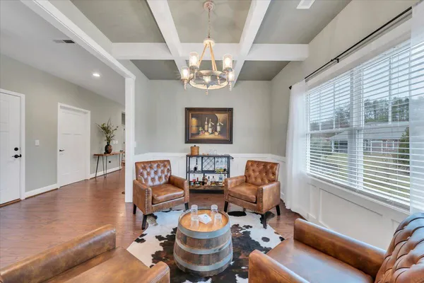 a view of livingroom with furniture and wooden floor