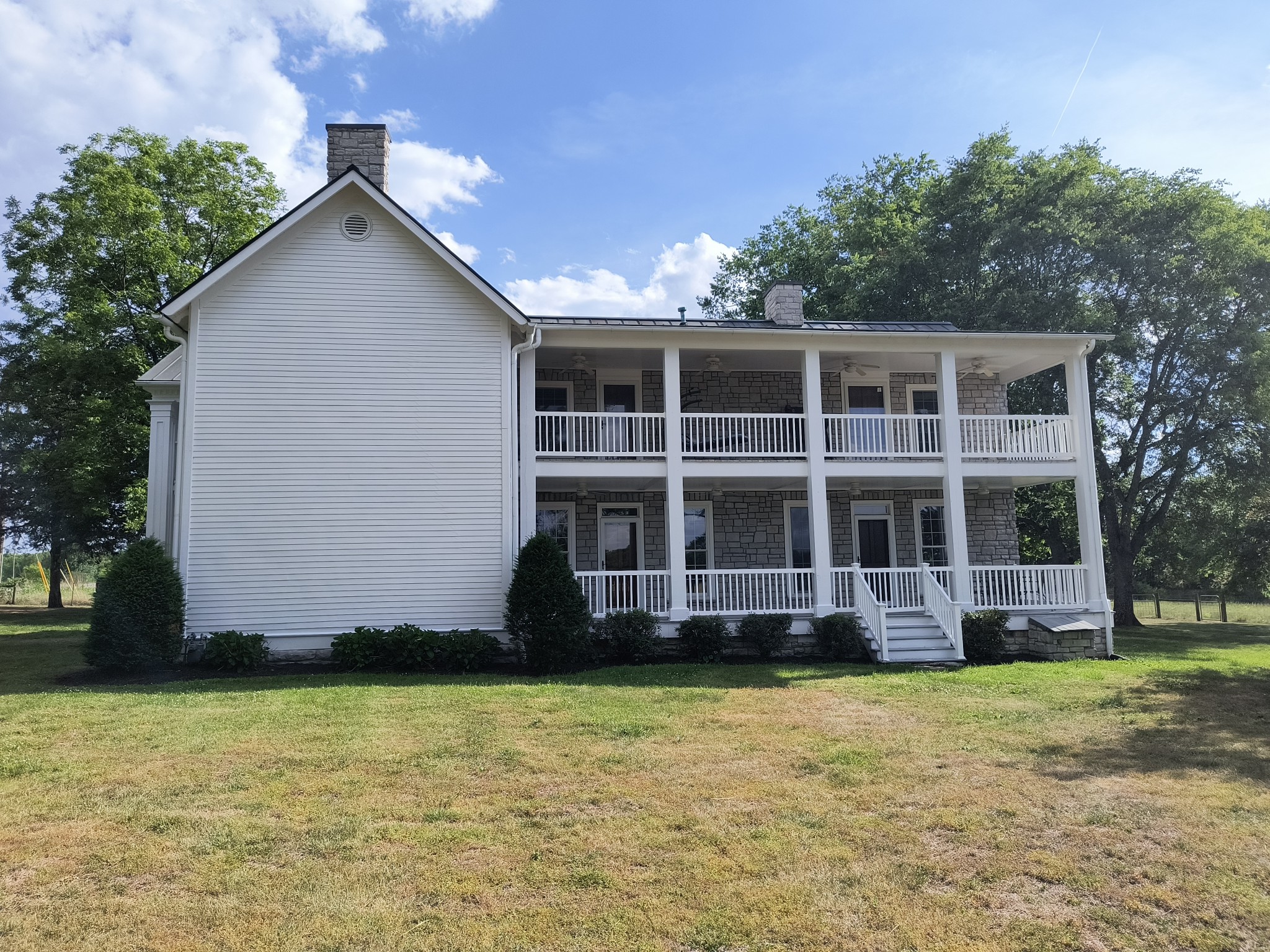 3460 Big Springs Road Lebanon, TN 37090 - Photo 7 of 74 a front view of a house with a yard