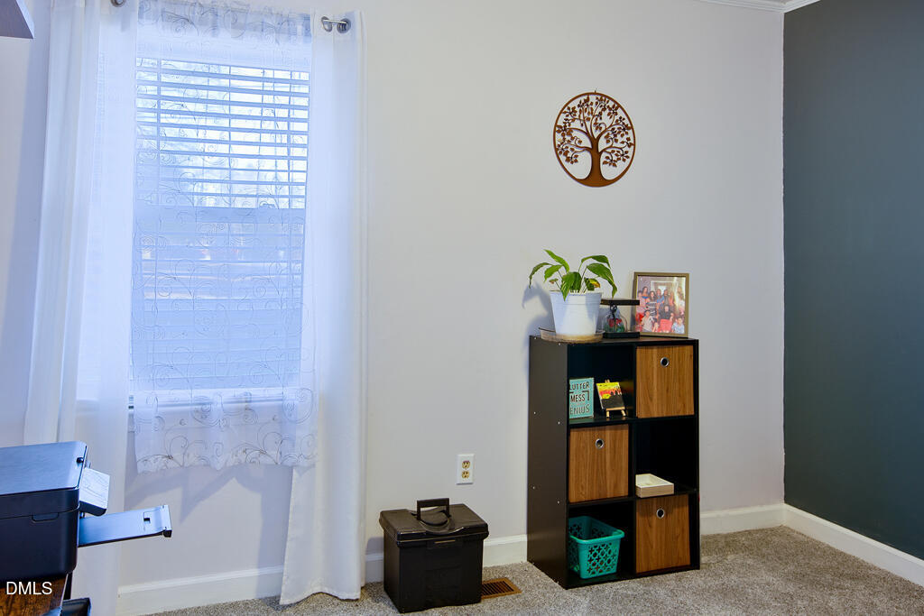 1727 Pinecrest Road Henderson, NC 27536 - Photo 8 of 14 a view of entryway with workspace and window