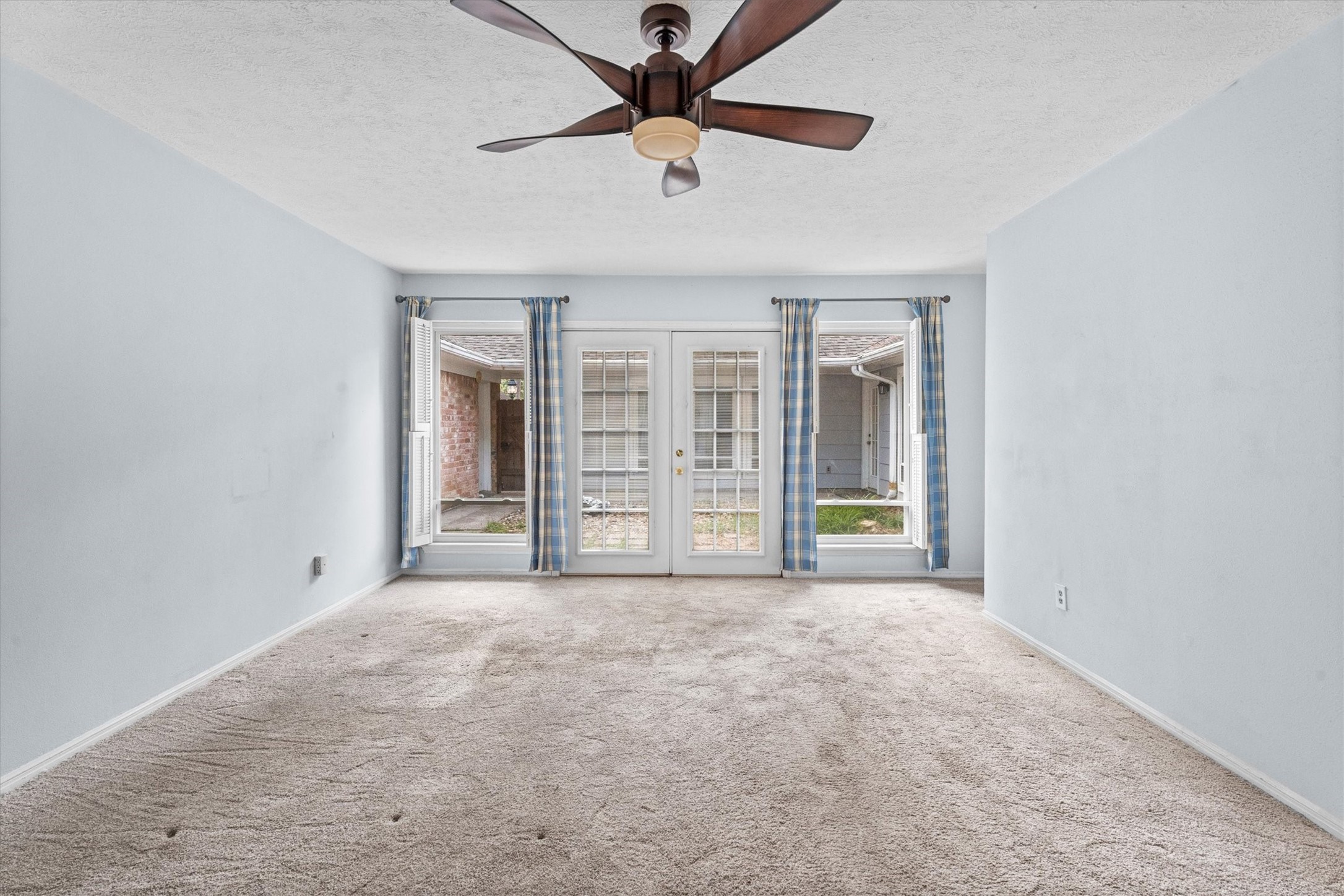 25319 Old Carriage Lane Spring, TX 77373 - Photo 21 of 35 a view of an empty room with a window
