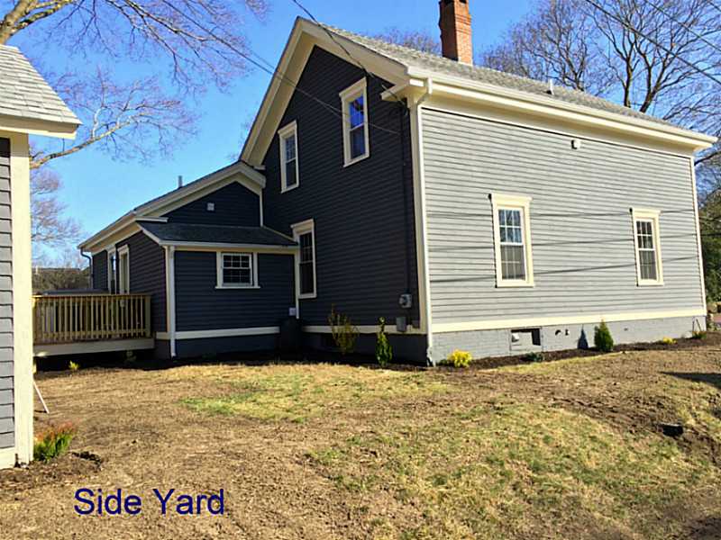 467 Ten Rod Road North Kingstown, RI 02852 - Photo 21 of 25 Exterior Back. Brand new 3 bedroom septic installed.
