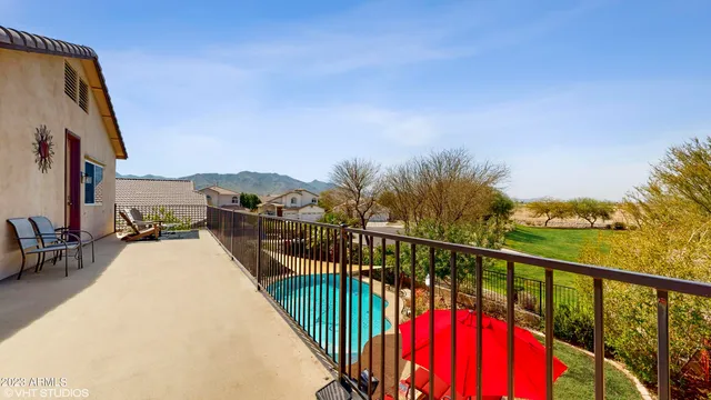 a view of balcony with furniture