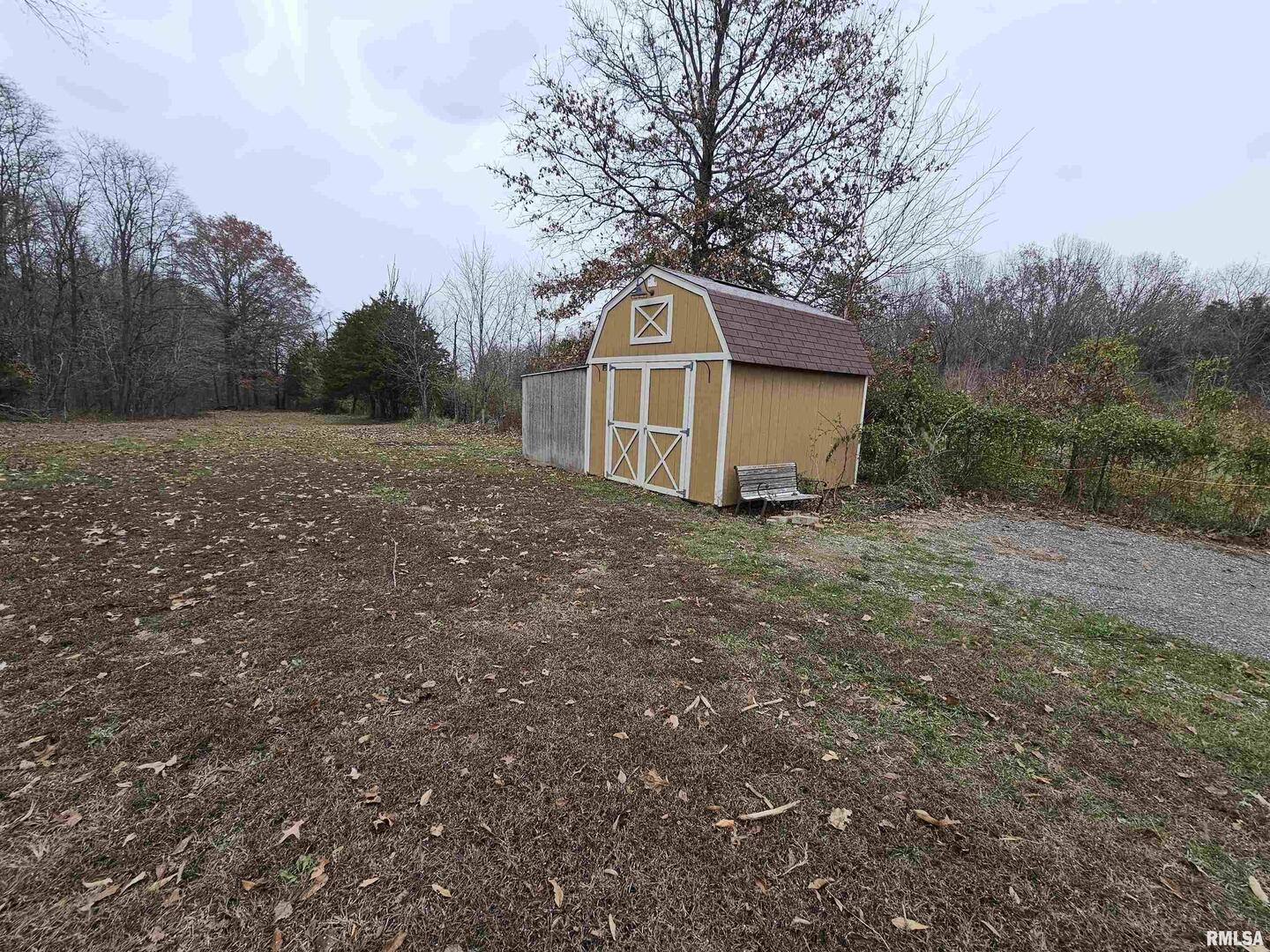 18266 East Liberty Road Opdyke, IL 62872 - Photo 11 of 34 a house with trees in the background