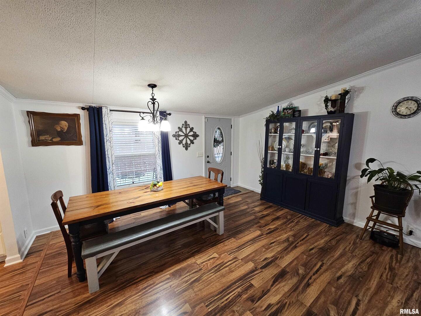18266 East Liberty Road Opdyke, IL 62872 - Photo 18 of 34 a bedroom with furniture and wooden floor