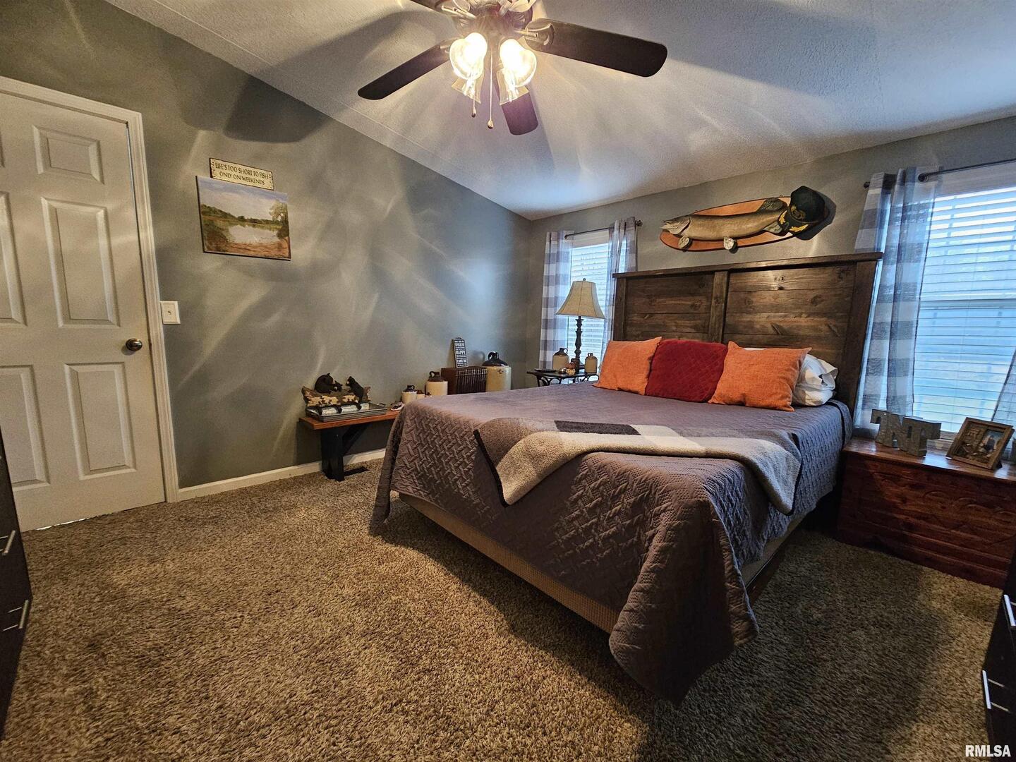 18266 East Liberty Road Opdyke, IL 62872 - Photo 26 of 34 a bedroom with a bed and a chandelier