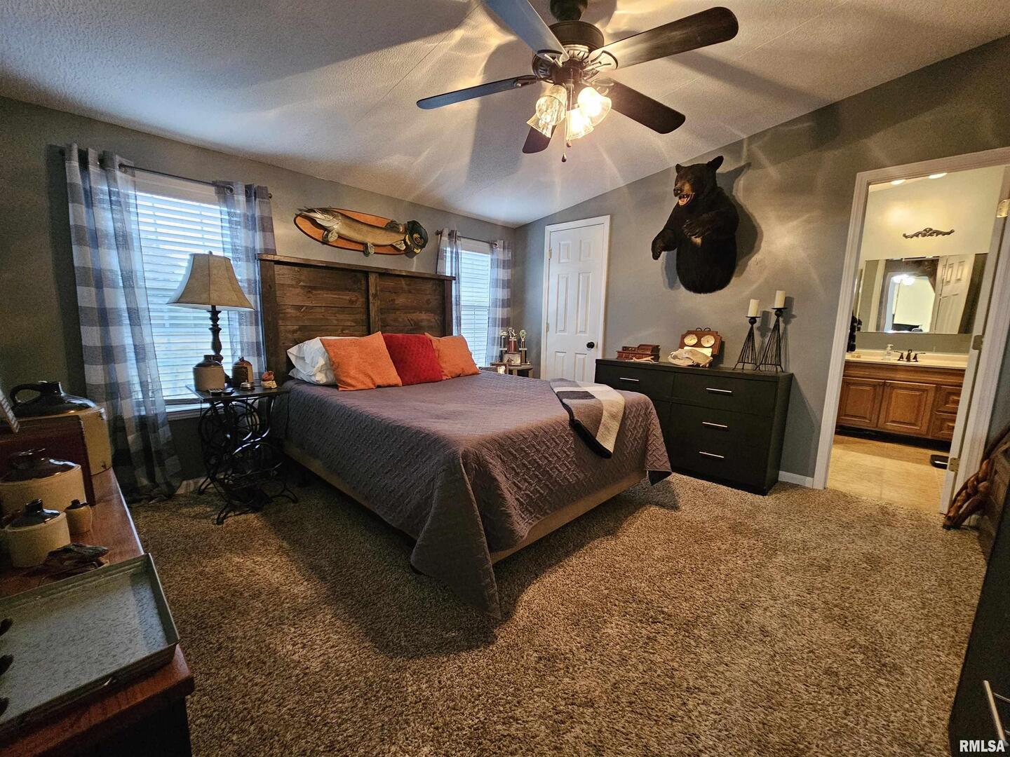 18266 East Liberty Road Opdyke, IL 62872 - Photo 27 of 34 a bedroom with a bed and ceiling fan