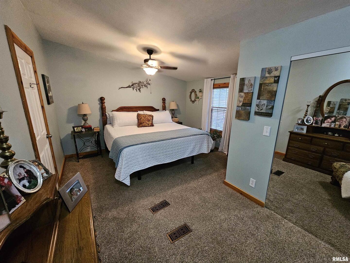 18266 East Liberty Road Opdyke, IL 62872 - Photo 29 of 34 a bedroom with a bed and a flat tv screen on the dresser