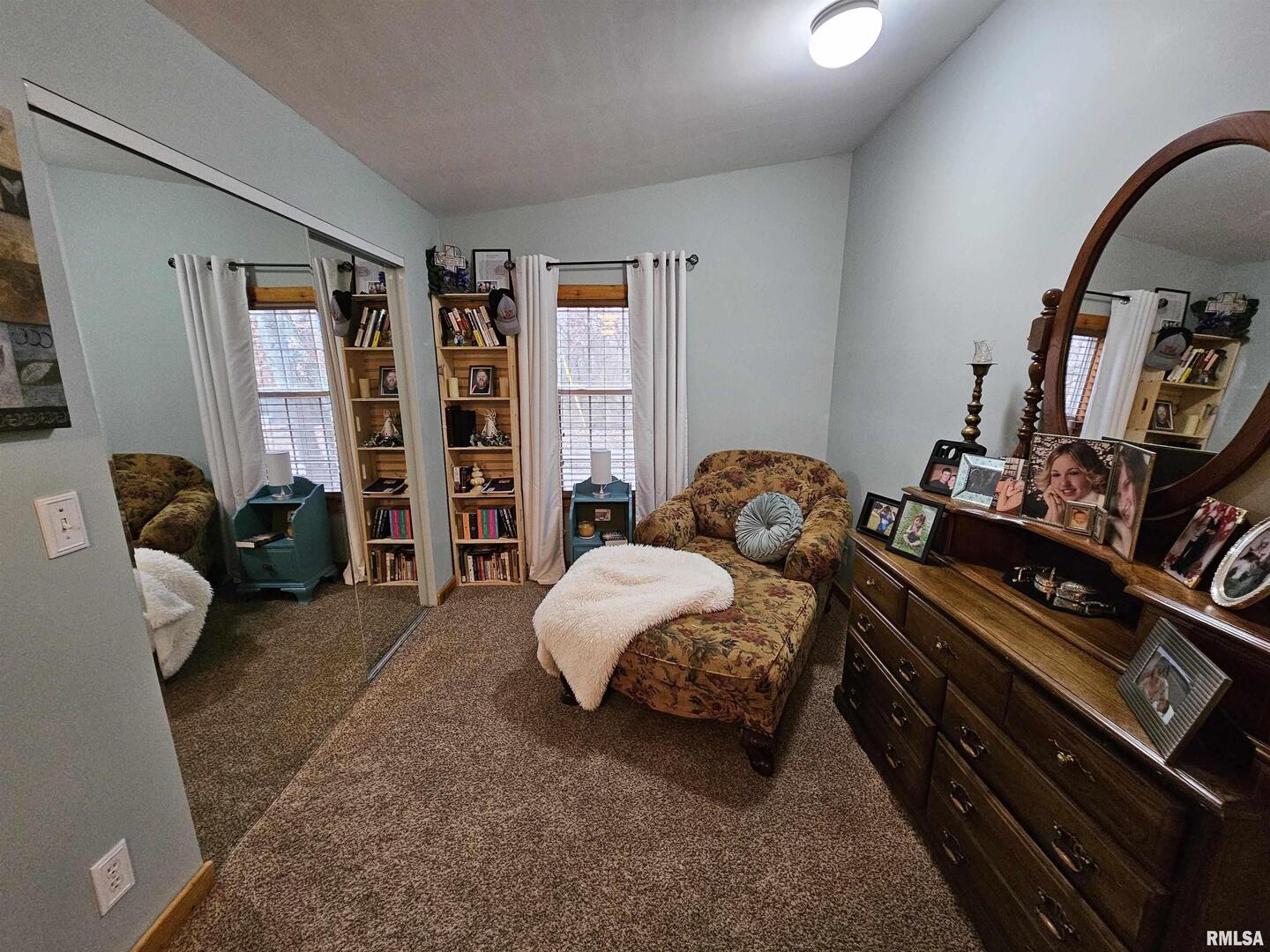 18266 East Liberty Road Opdyke, IL 62872 - Photo 31 of 34 a bedroom with furniture and a book shelf