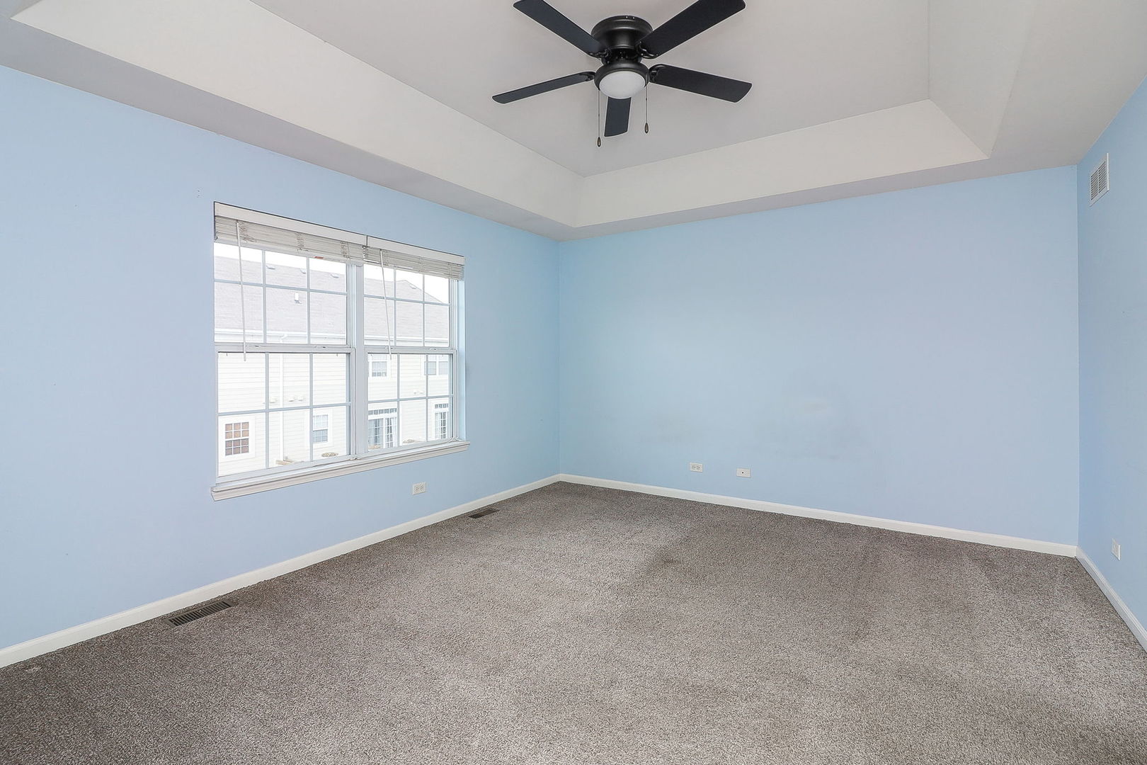 317 Timber Ridge Court, Unit 131 Joliet, IL 60431 - Photo 11 of 23 an empty room with a window