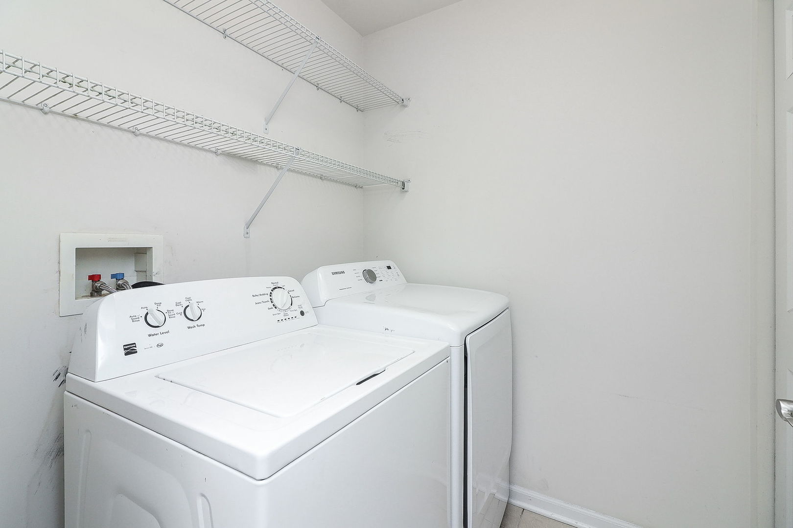 317 Timber Ridge Court, Unit 131 Joliet, IL 60431 - Photo 15 of 23 a utility room with dryer and washer