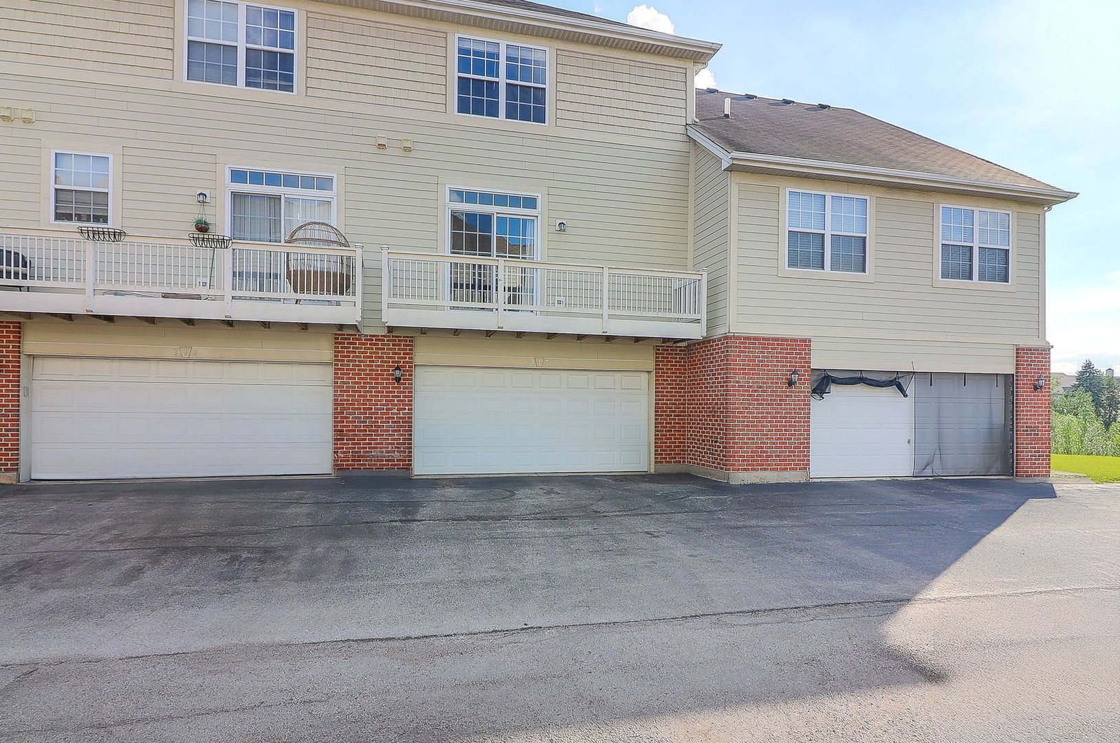 317 Timber Ridge Court, Unit 131 Joliet, IL 60431 - Photo 19 of 23 a front view of house with yard