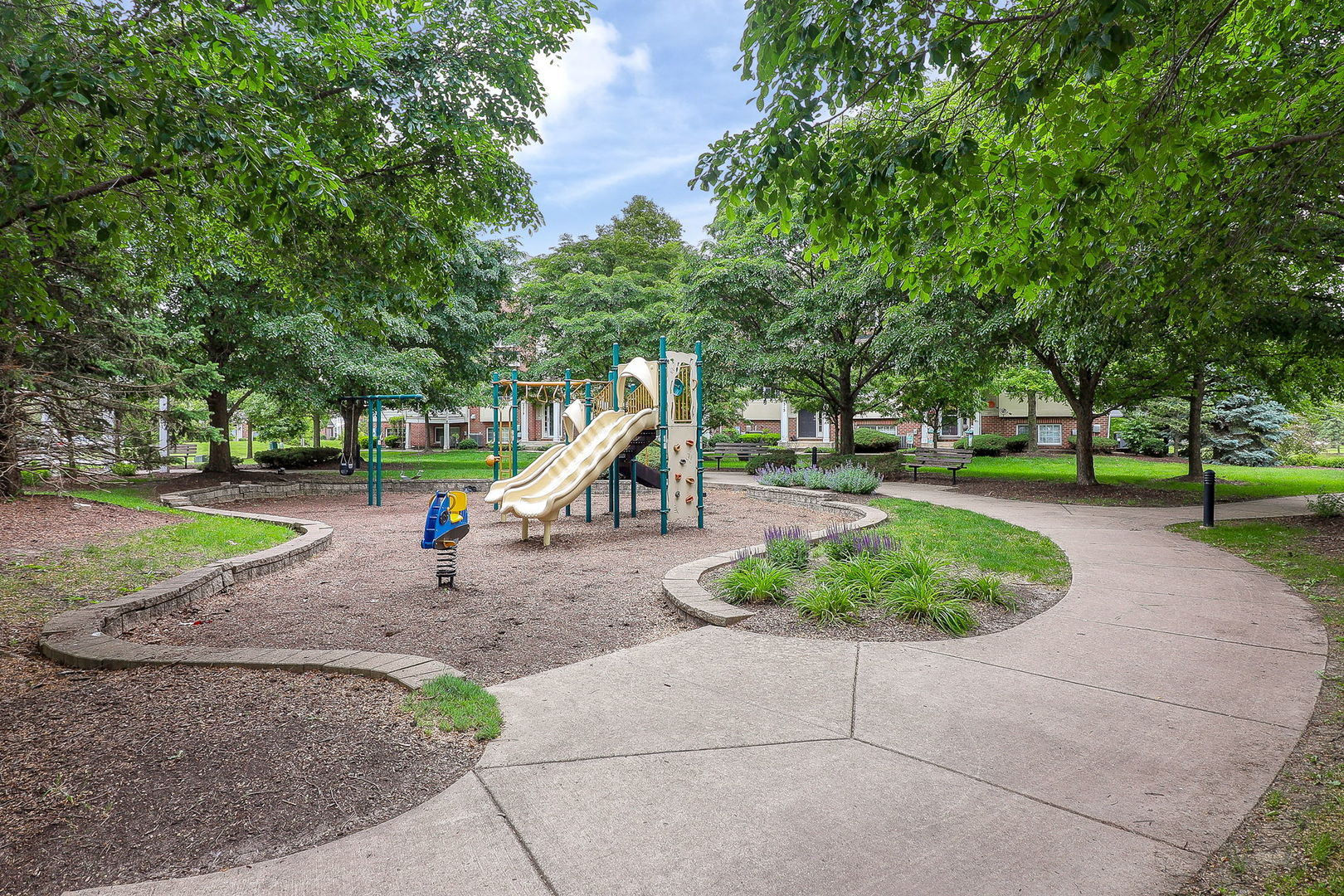 317 Timber Ridge Court, Unit 131 Joliet, IL 60431 - Photo 22 of 23 a view of a park with slide