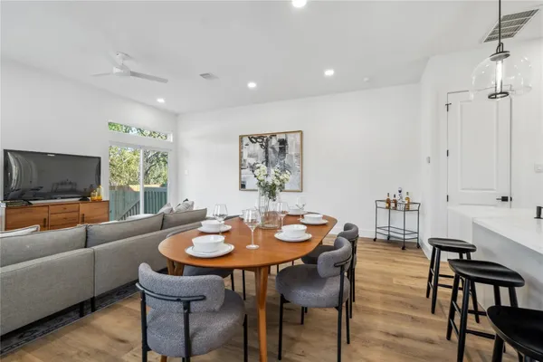 a view of a dining room with furniture