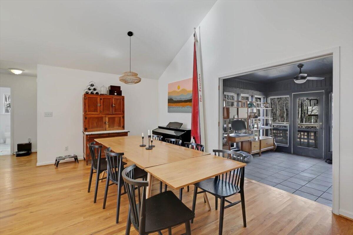2265 Little Bend Road Signal Mountain, TN 37377 - Photo 11 of 31 a view of a dining room with furniture and wooden floor