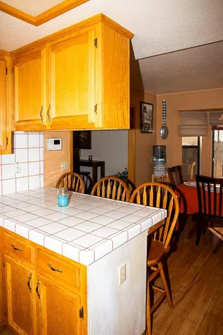 a view of a dining table and chairs