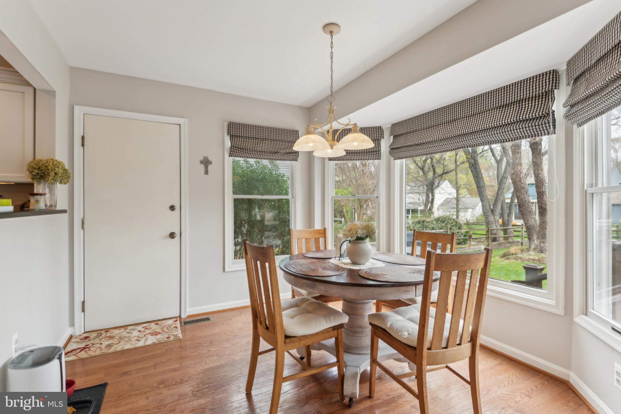 306 Saddle Ridge Road Annapolis, MD 21403 - Photo 15 of 44 a view of a dining room with furniture window and outside view