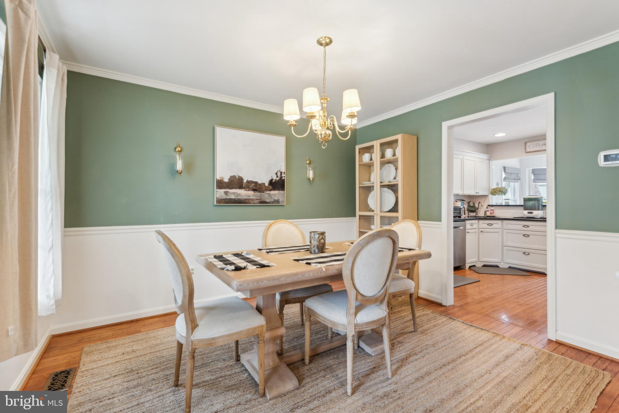 306 Saddle Ridge Road Annapolis, MD 21403 - Photo 21 of 44 a view of a dining room with furniture and wooden floor