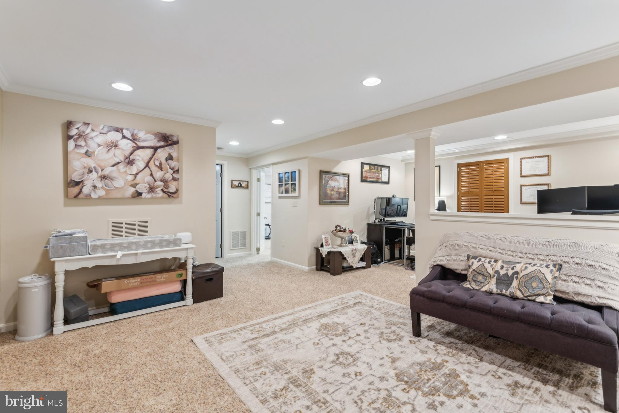 306 Saddle Ridge Road Annapolis, MD 21403 - Photo 31 of 44 a living room with furniture and a fireplace