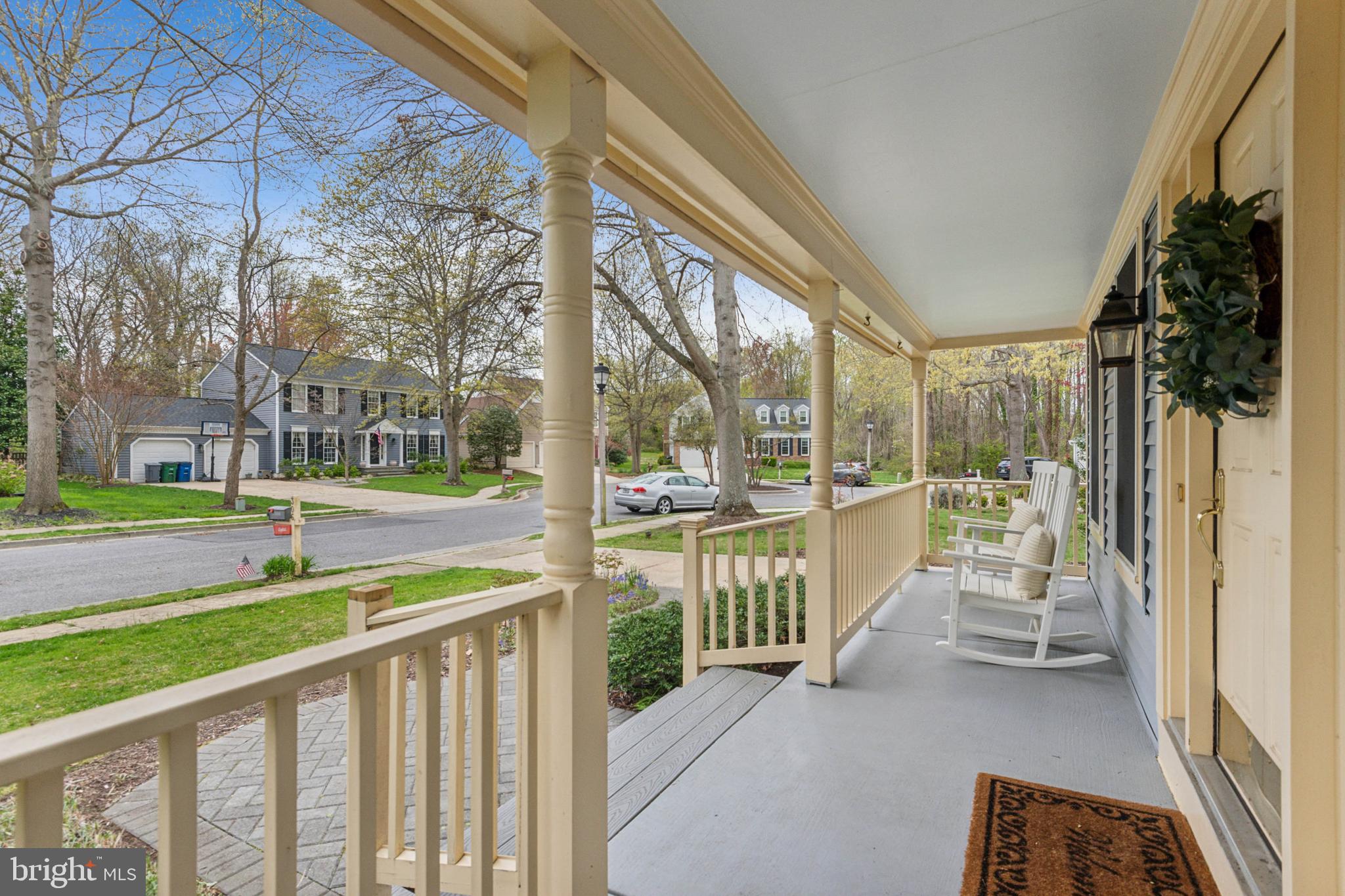306 Saddle Ridge Road Annapolis, MD 21403 - Photo 4 of 44 a view of a porch with wooden floor and fence