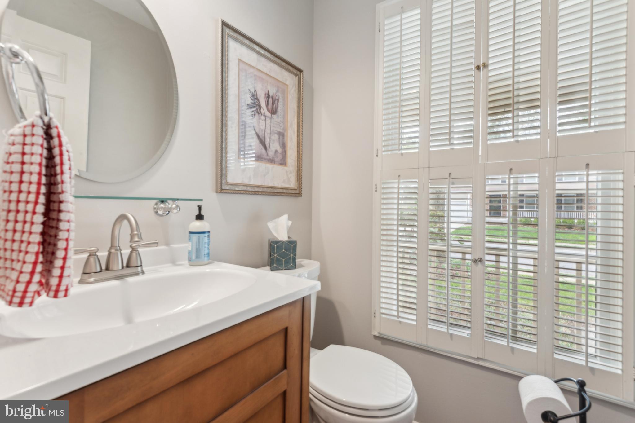 306 Saddle Ridge Road Annapolis, MD 21403 - Photo 8 of 44 a bathroom with a sink a toilet and shower