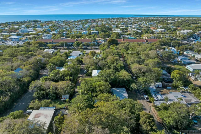 an aerial view of a city with lots of residential buildings