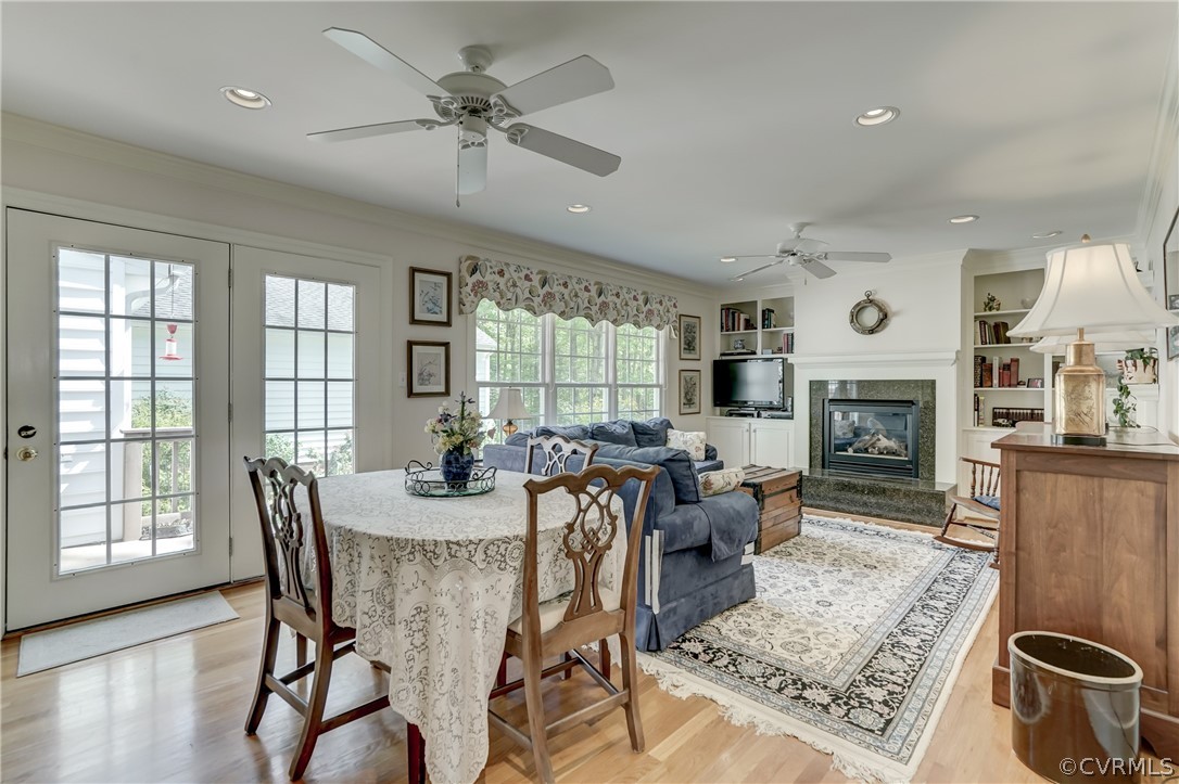 1607 Genito Road Crozier, VA 23039 - Photo 14 of 49 a view of a dining room with furniture window and wooden floor