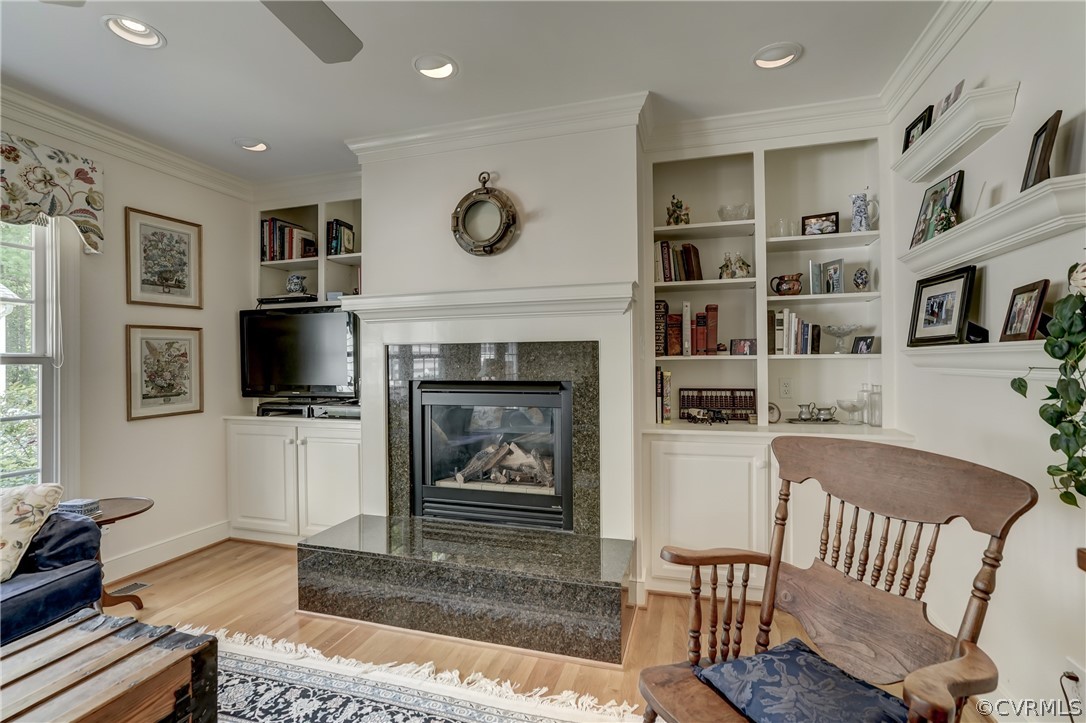 1607 Genito Road Crozier, VA 23039 - Photo 16 of 49 a living room with furniture and a fireplace