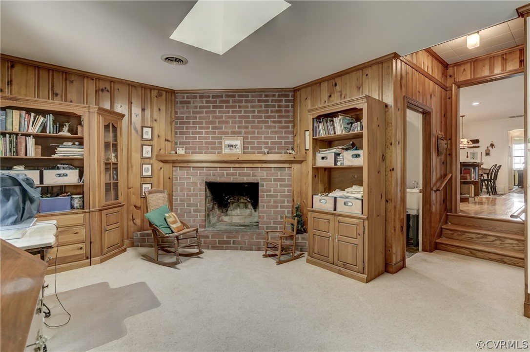 1607 Genito Road Crozier, VA 23039 - Photo 21 of 49 a living room with furniture and a fireplace
