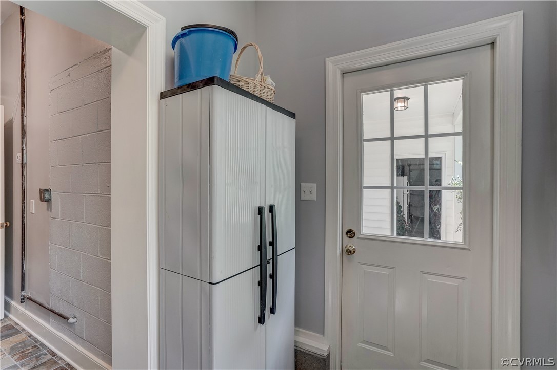 1607 Genito Road Crozier, VA 23039 - Photo 28 of 49 a bathroom with a vanity and a mirror