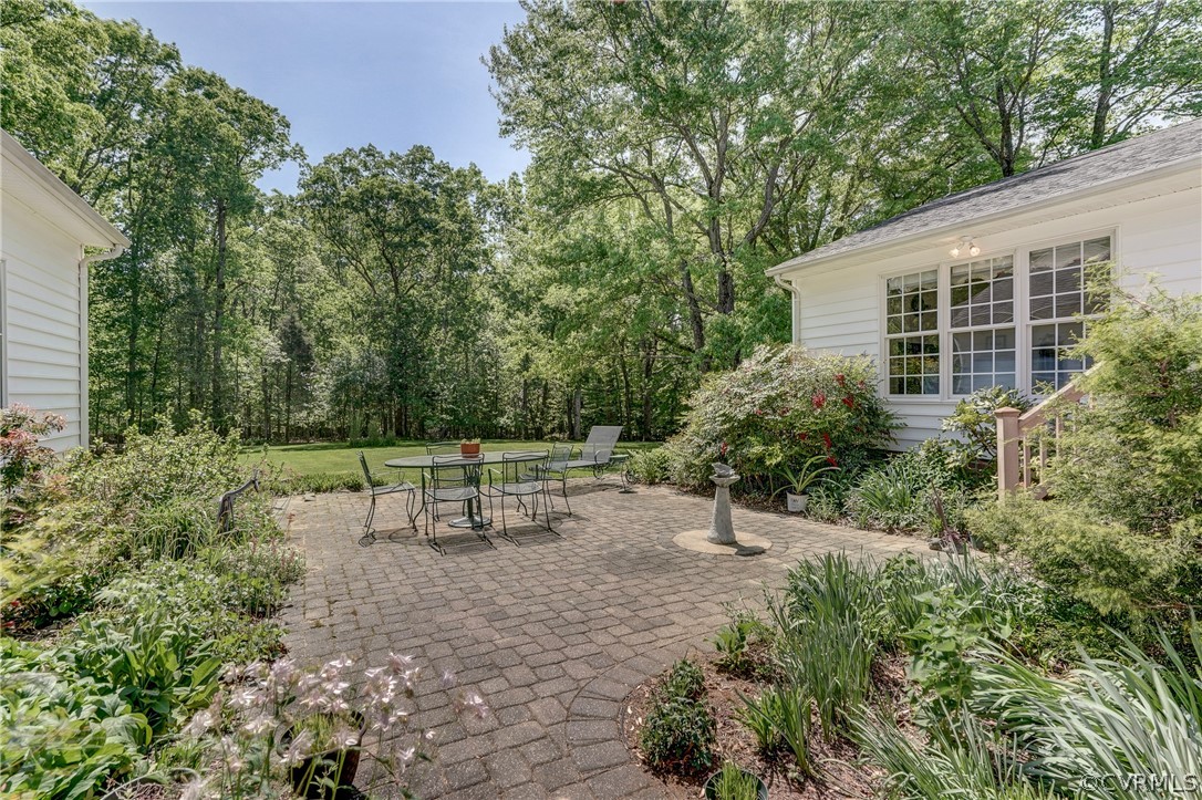 1607 Genito Road Crozier, VA 23039 - Photo 30 of 49 a view of a bench in a garden