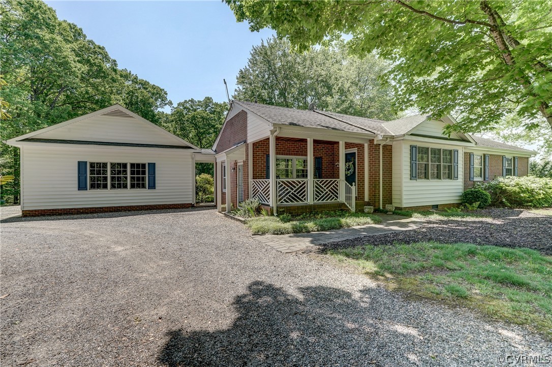 1607 Genito Road Crozier, VA 23039 - Photo 36 of 49 a view of a house with a yard