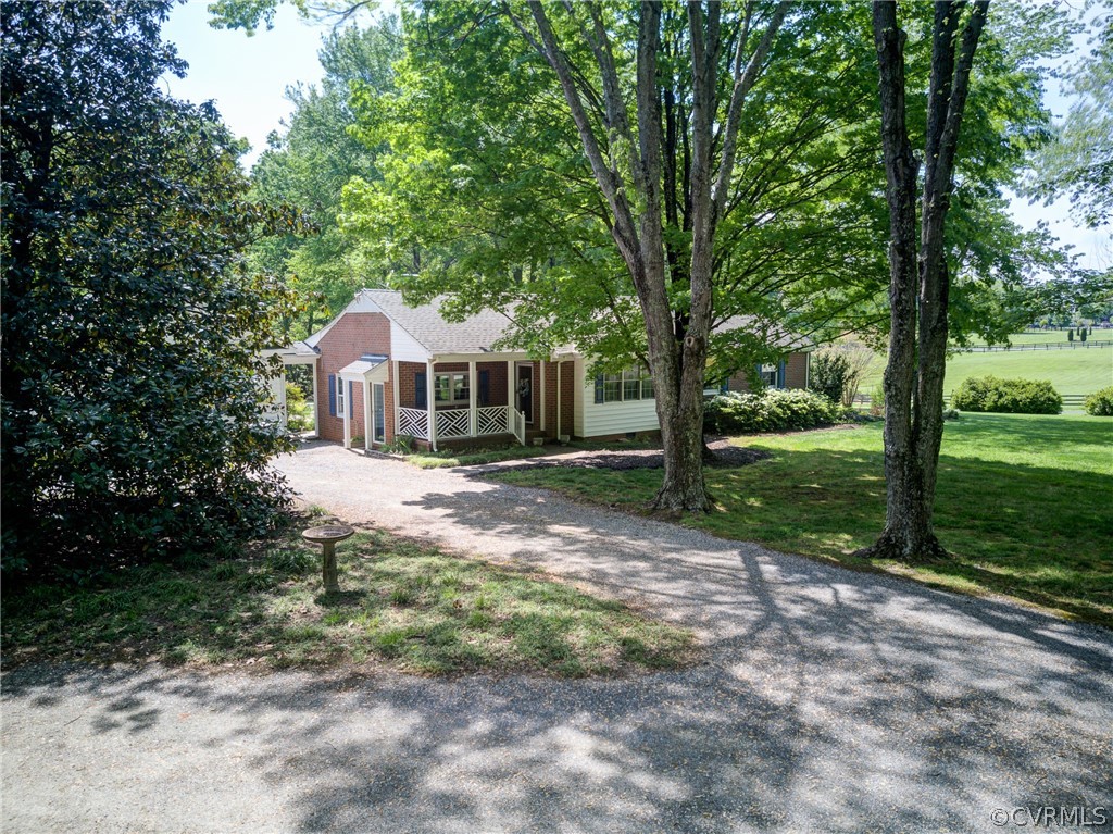 1607 Genito Road Crozier, VA 23039 - Photo 39 of 49 a front view of a house with yard and green space