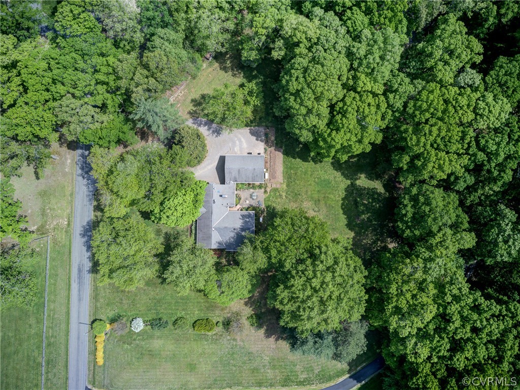 1607 Genito Road Crozier, VA 23039 - Photo 46 of 49 an aerial view of a house with a yard