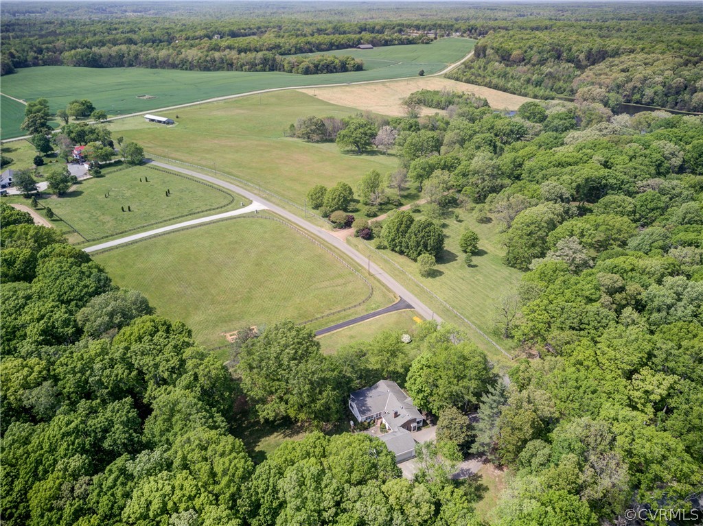 1607 Genito Road Crozier, VA 23039 - Photo 48 of 49 an aerial view of a residential houses with outdoor space and trees